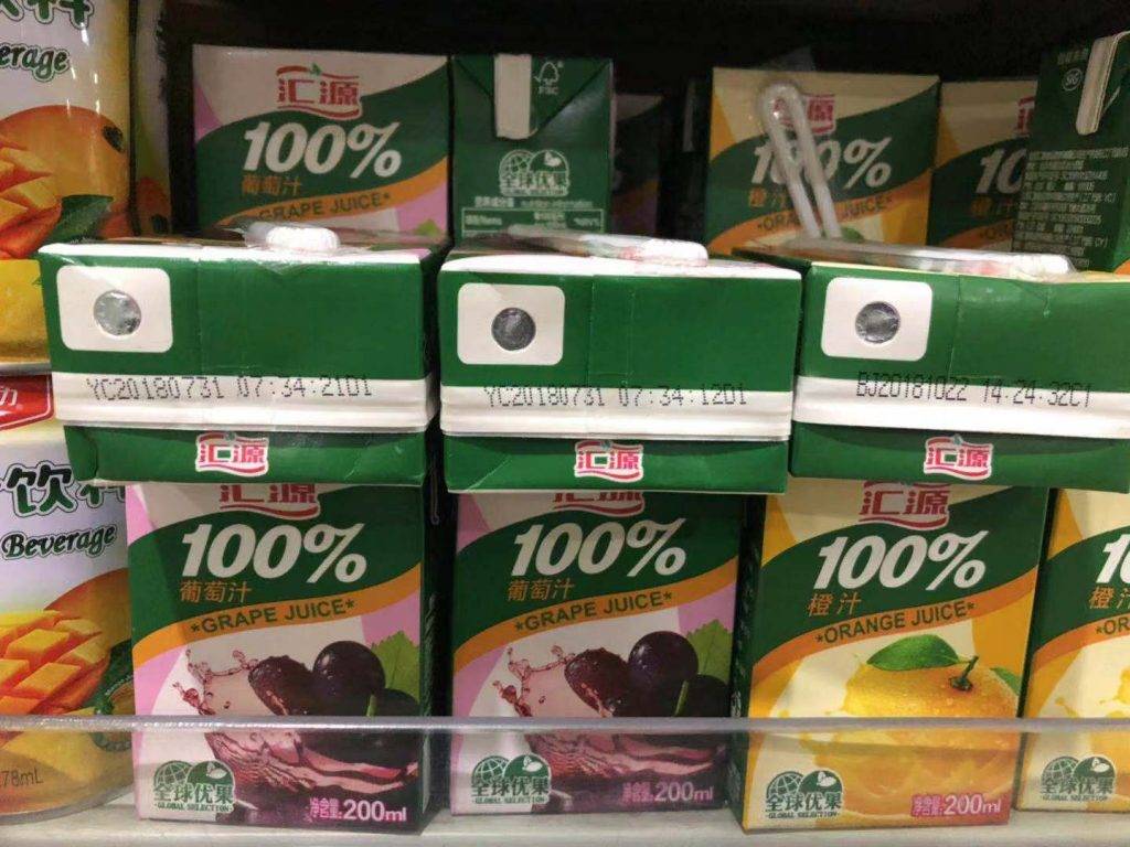 汇源饮料纸盒顶部的数字字母点阵象征