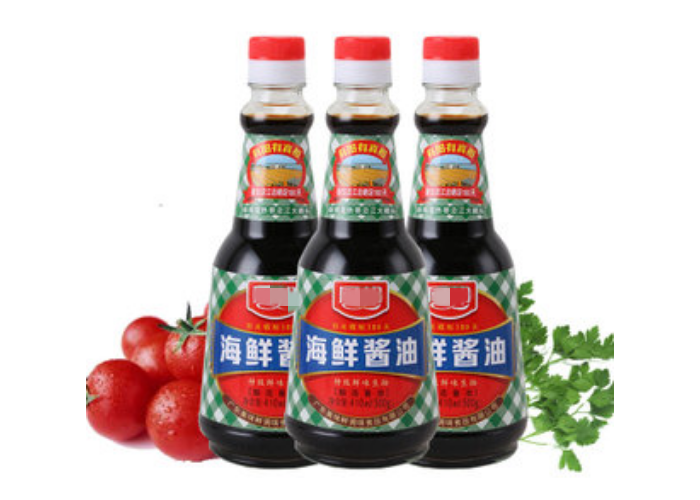 三瓶海鲜酱油及蔬菜摆放图